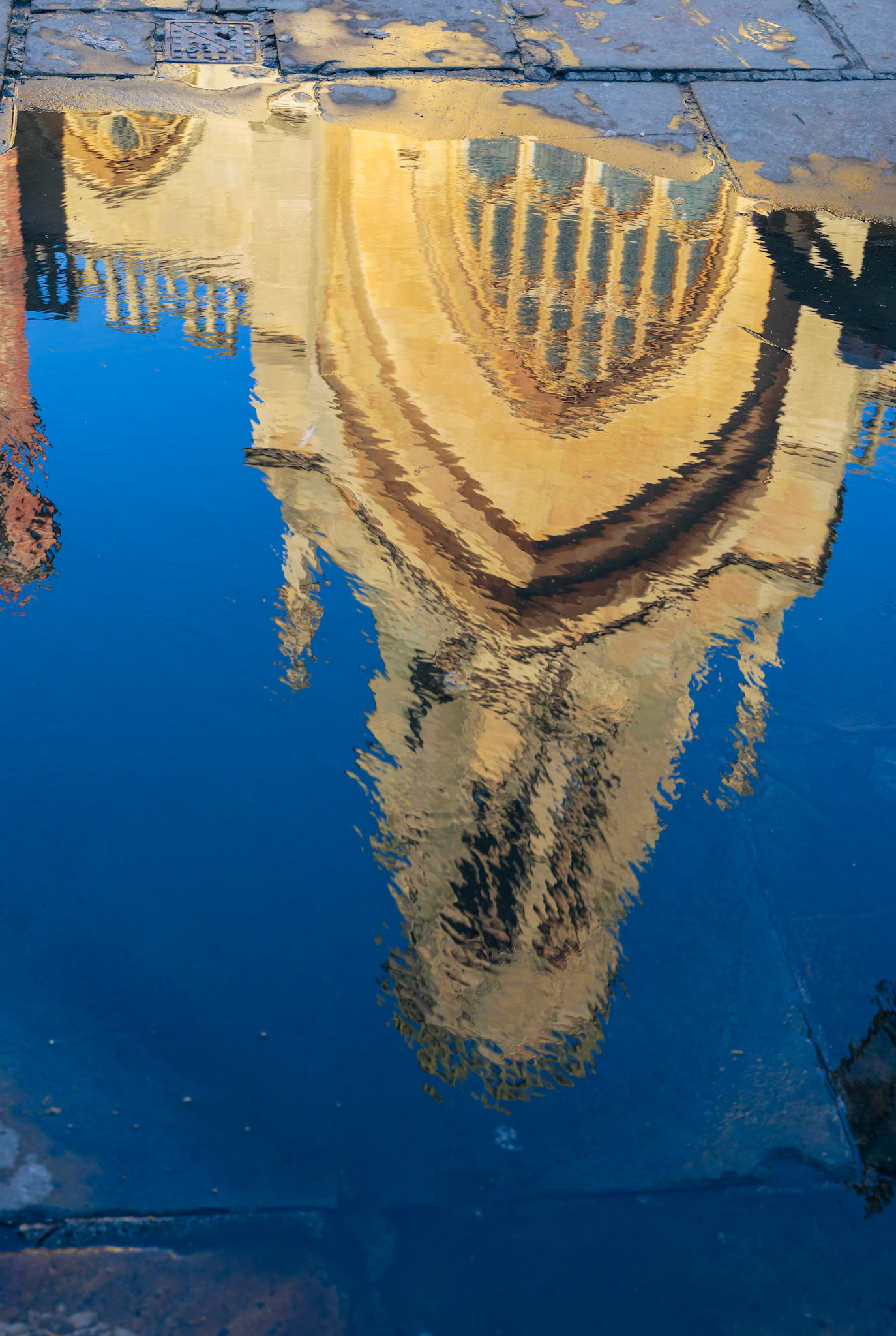 YORK, NORTH YORKSHIRE/UK - FEBRUARY 20 : Reflection of St Helen Stonegate church in a puddle in York, North Yorkshire on February 20, 2020