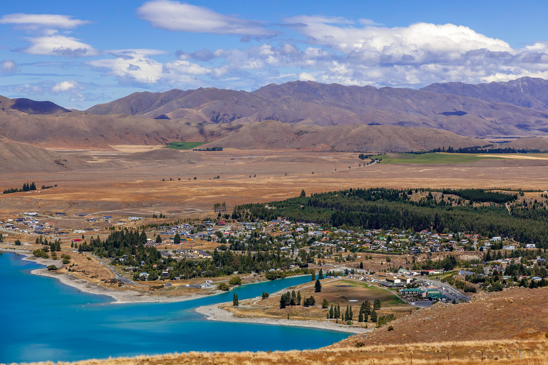 TEKAPO, NEW ZEALAND - FEBRUARY 23 : Distant view of the town of Tekapo on the shore of Lake Tekapo in New Zealand on February 23, 2012
