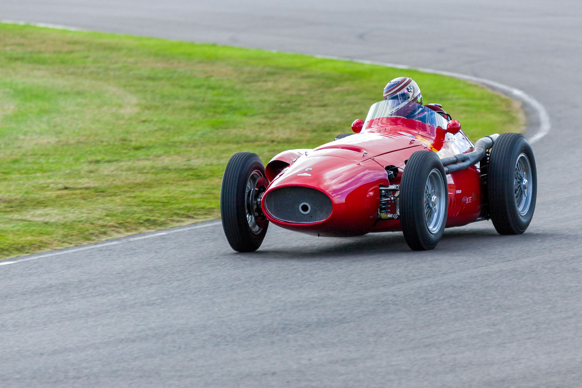 GOODWOOD, WEST SUSSEX/UK - SEPTEMBER 14 : Vintage Racing at Goodwood West Sussex on September 14, 2012. One unidentified person